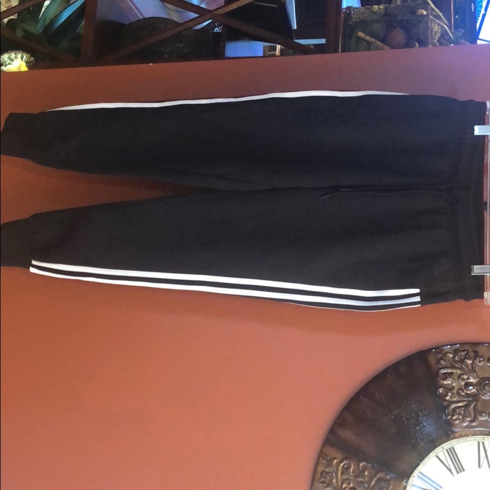 Adidas black and white joggers.